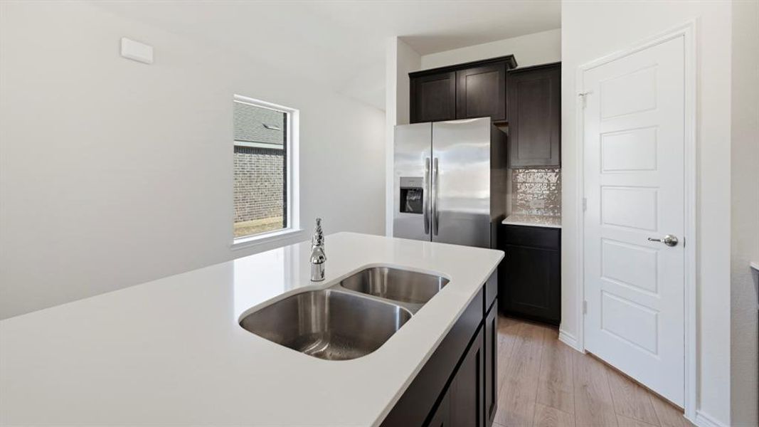 Furnished interior view inside a new home in The Woods at Lindsey Place, Anna (Image 4).