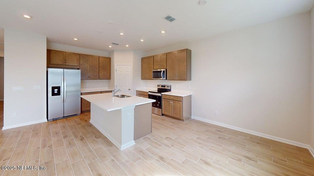 Furnished interior view inside a new home in Sandridge Hills, Green Cove Springs (Image 5).