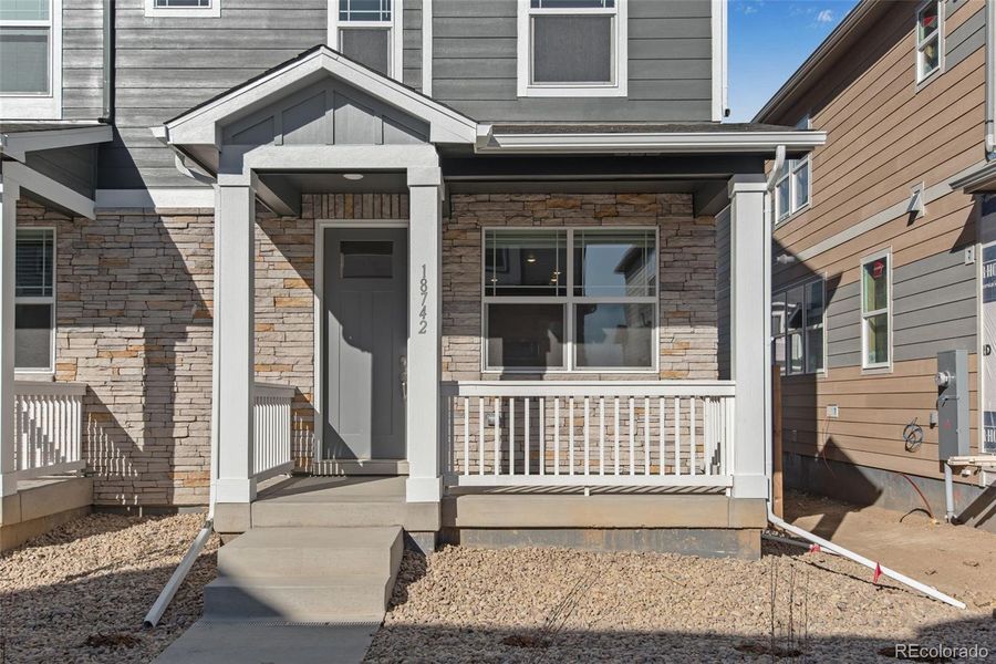 Exterior details and patio area of a home in Settlers Crossing, Commerce City (Image 4).