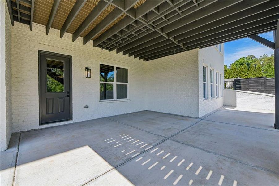 Exterior details and patio area of a home in , Buford (Image 33).