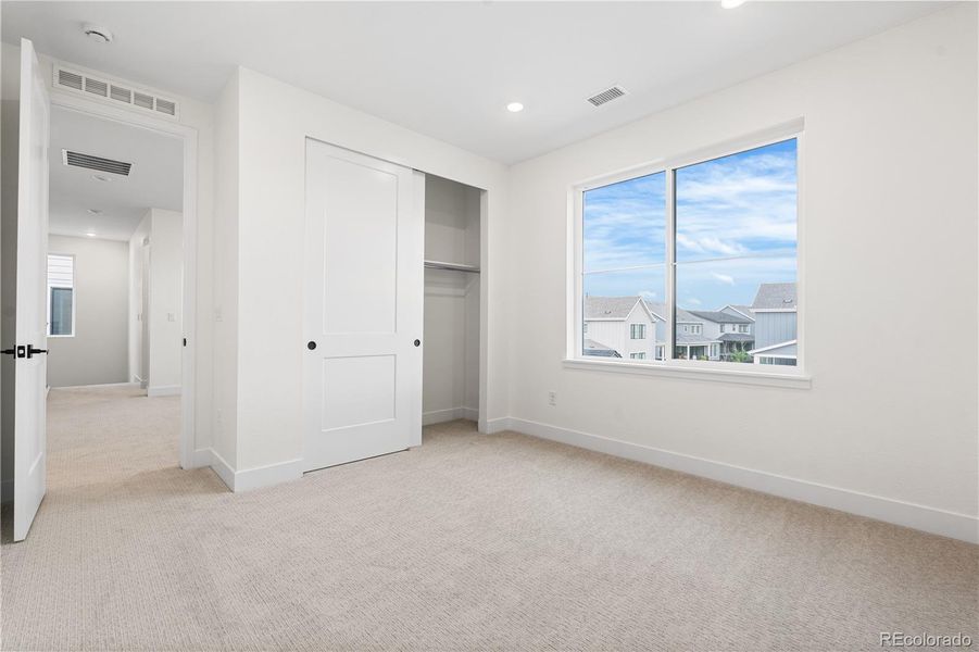 Spacious, unfurnished interior of a new home in Stargaze at Solstice, Littleton (Image 41).