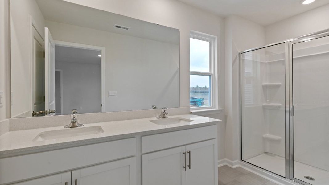 Furnished interior view inside a new home in The Grove at Matthews Landing, Fuquay Varina (Image 8).