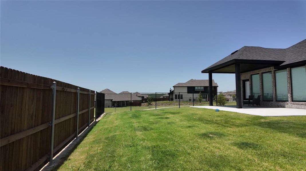 Exterior details and patio area of a home in Panchasarp Farms, Burleson (Image 4). Exterior details and patio area of a home in Panchasarp Farms, Burleson (Image 4).
