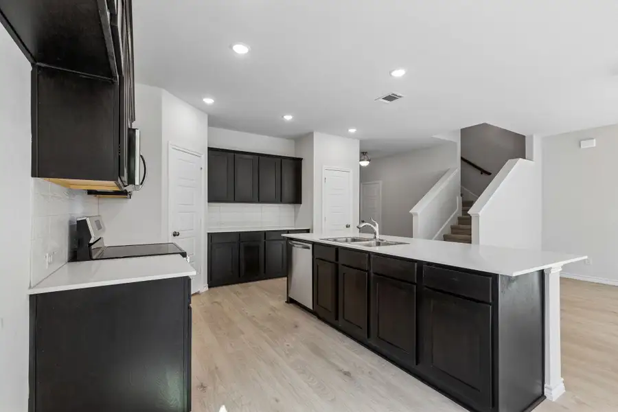 Furnished interior view inside a new home in Eagle Cove, Denton (Image 12).