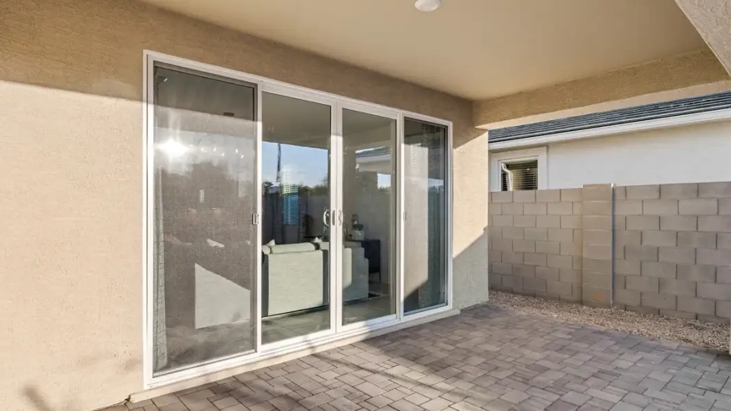 Exterior details and patio area of a home in Zanjero Pass, Waddell (Image 26).
