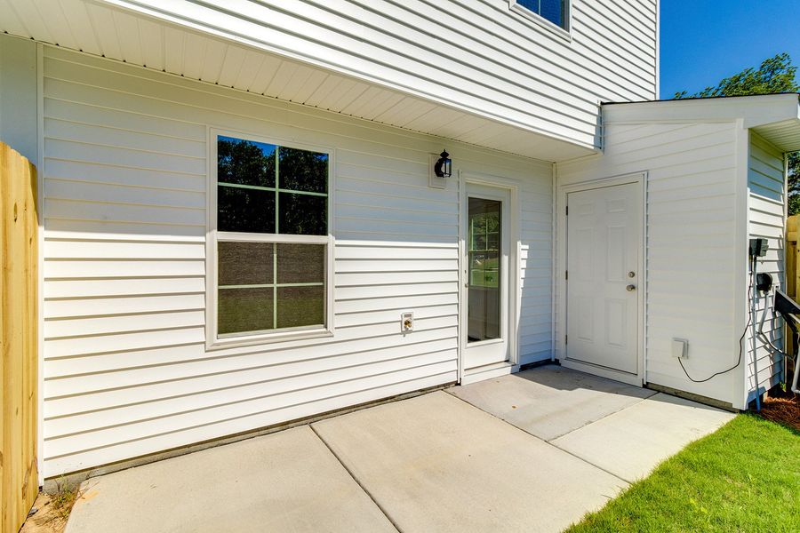 Exterior details and patio area of a home in Padgett Commons, Hopkins (Image 3).