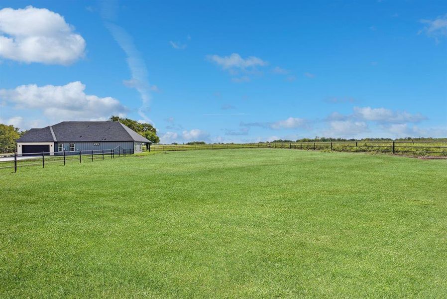 View of yard with a rural view View of yard with a rural view