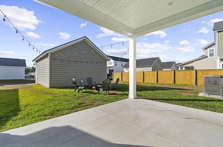 Exterior details and patio area of a home in Heron's Walk at Summers Corner, Summerville (Image 26).