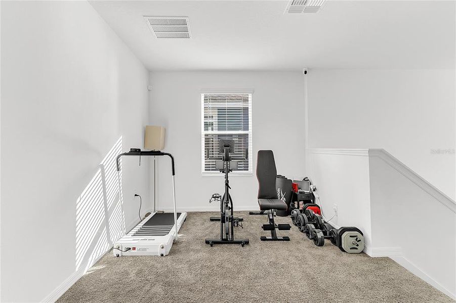 Furnished interior view inside a new home in Peace Creek Reserve, Winter Haven (Image 10).