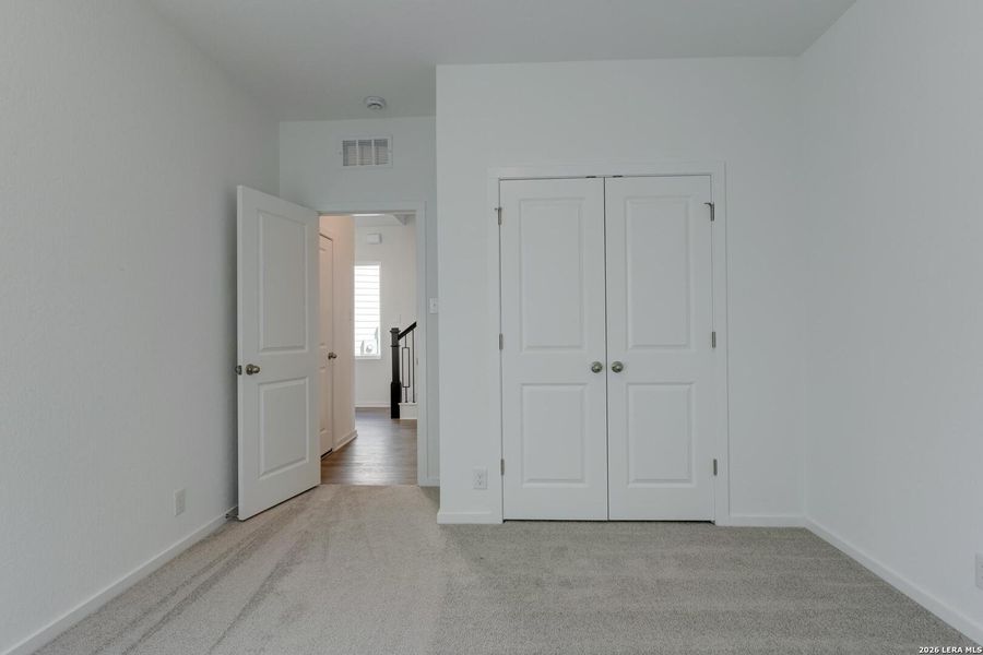 Spacious, unfurnished interior of a new home in Hennersby Hollow, San Antonio (Image 24).