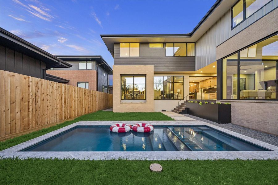 Exterior details and patio area of a home in , Bellaire (Image 25).