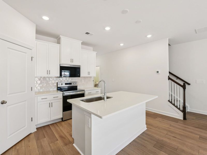 Furnished interior view inside a new home in Rocky River Towns, Charlotte (Image 5).