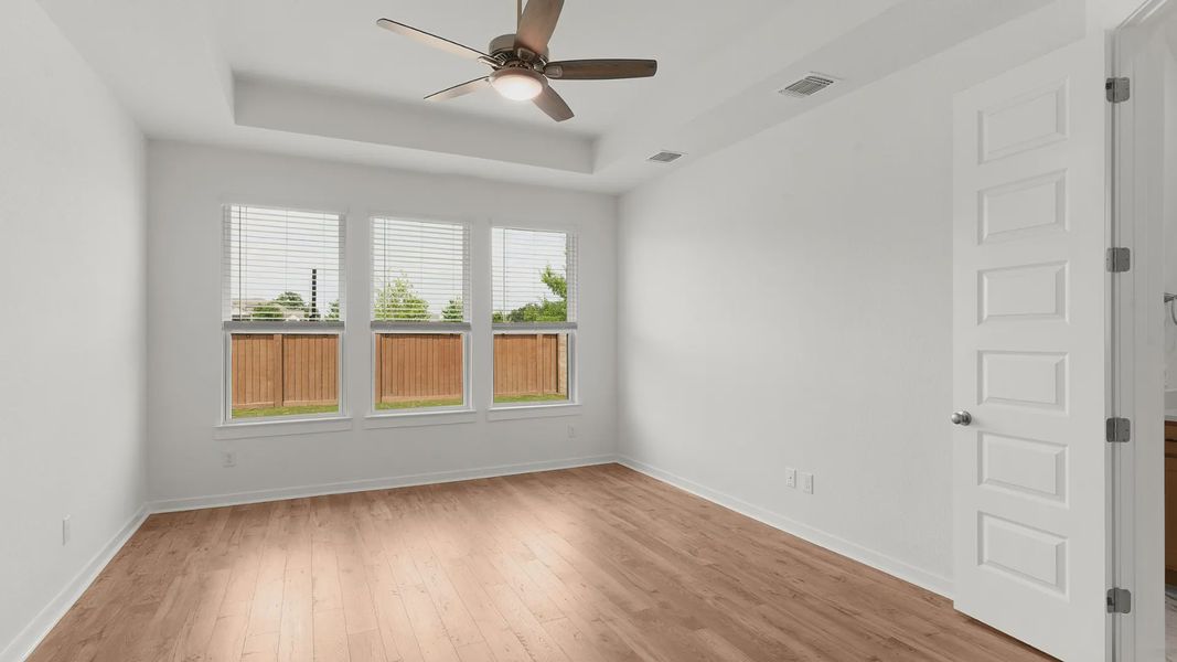 Representative unfurnished interior of a home built from the Bryson by Chesmar Homes in Newhaven, Manor (Image 17).