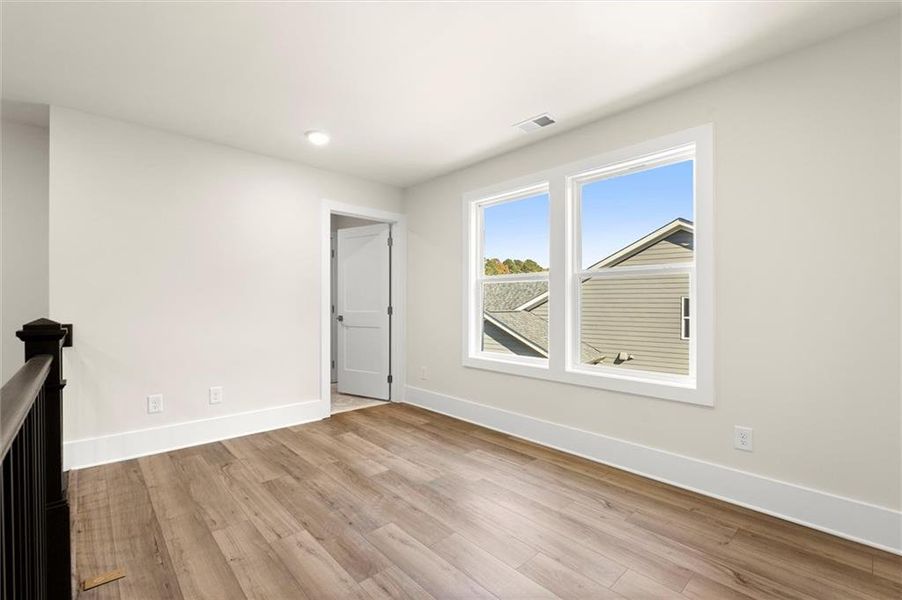 Spacious, unfurnished interior of a new home in Hillgrove Preserve, Powder Springs (Image 27).