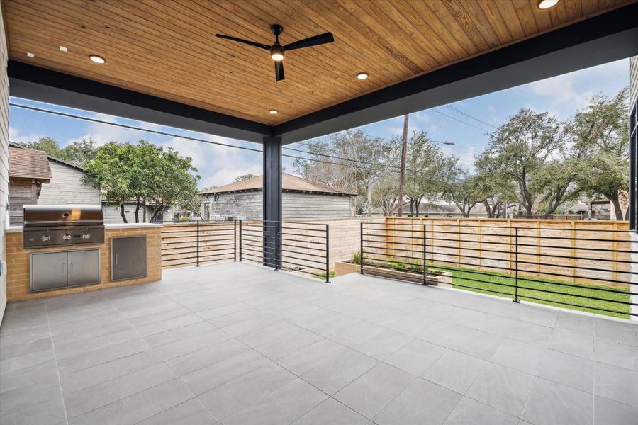 Rear and Front patio ceiling finished with stained natural wood.