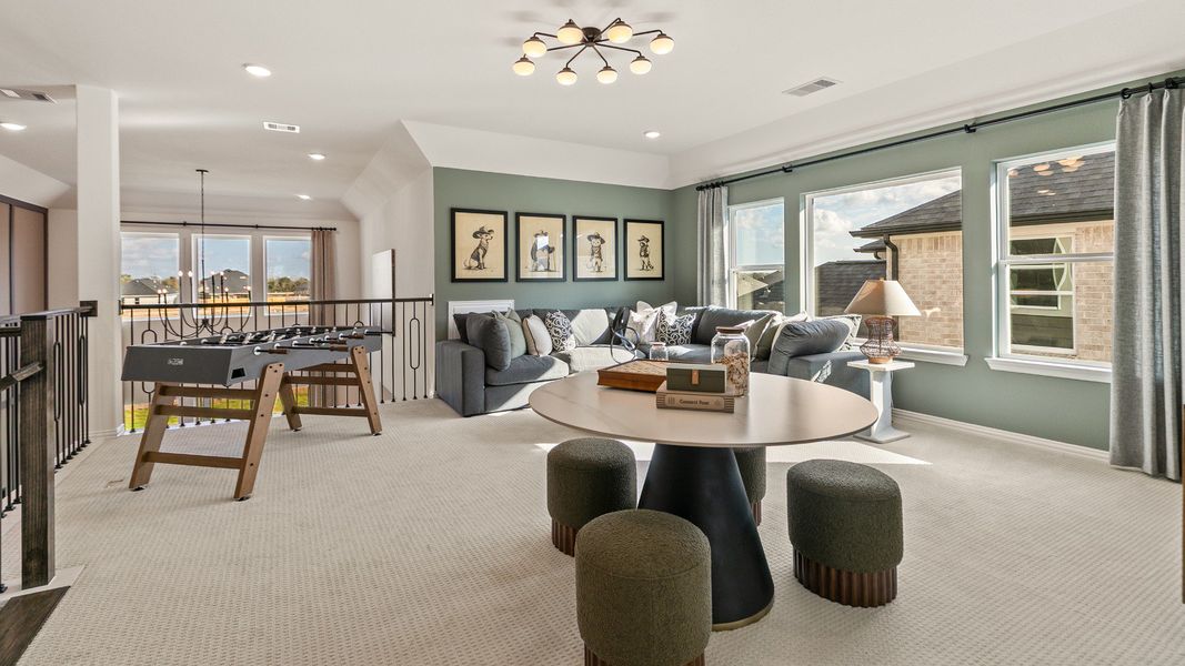 Representative furnished interior of a home built from the Rosewood by Brightland Homes in Sunterra, Katy (Image 17).