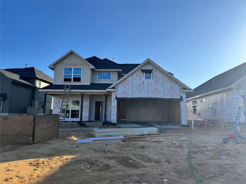 In-progress construction of a new home in Audubon, Magnolia, TX (Image 4).