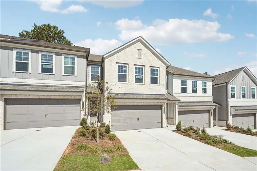 Front exterior of a new home in Langston Reserve, Cartersville, GA, highlighting curb appeal (Image 2). Front exterior of a new home in Langston Reserve, Cartersville, GA, highlighting curb appeal (Image 2).