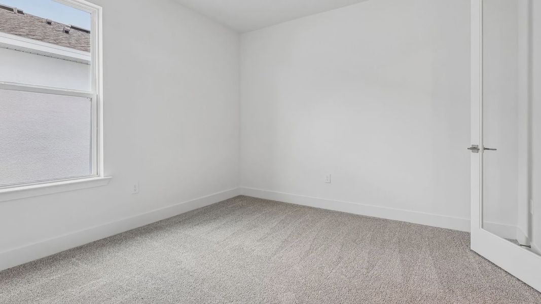 Furnished interior view inside a new home in Ardisia Park, New Smyrna Beach (Image 21).