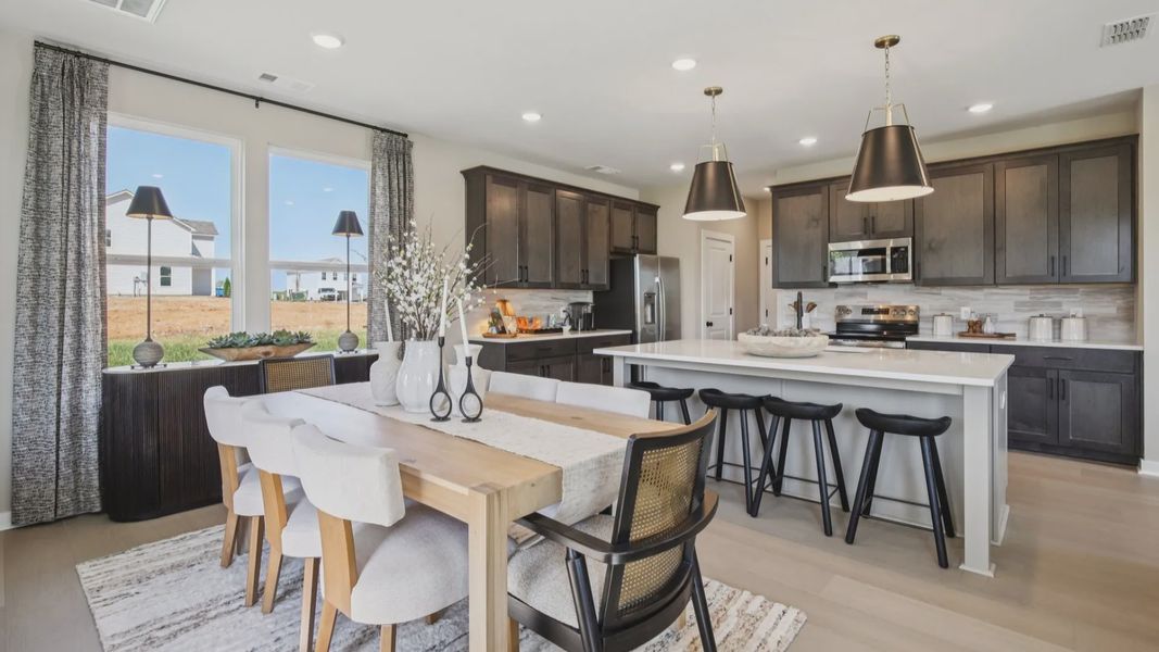 Dining area with view of kitchen