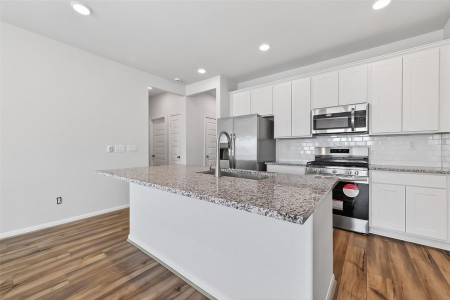 Furnished interior view inside a new home in , Magnolia (Image 14). Furnished interior view inside a new home in , Magnolia (Image 14).