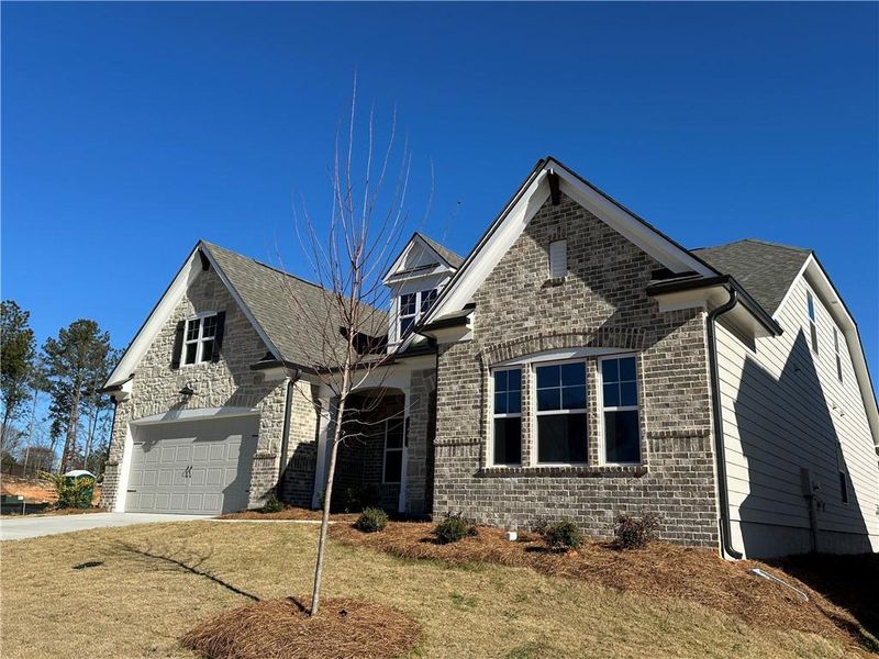 Front exterior of a new home in Summerlin, Auburn, GA, highlighting curb appeal (Image 25).