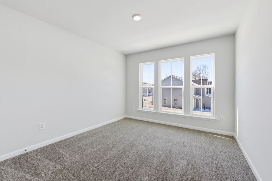 Spacious, unfurnished interior of a new home in Poets Walk, Whitsett (Image 23).