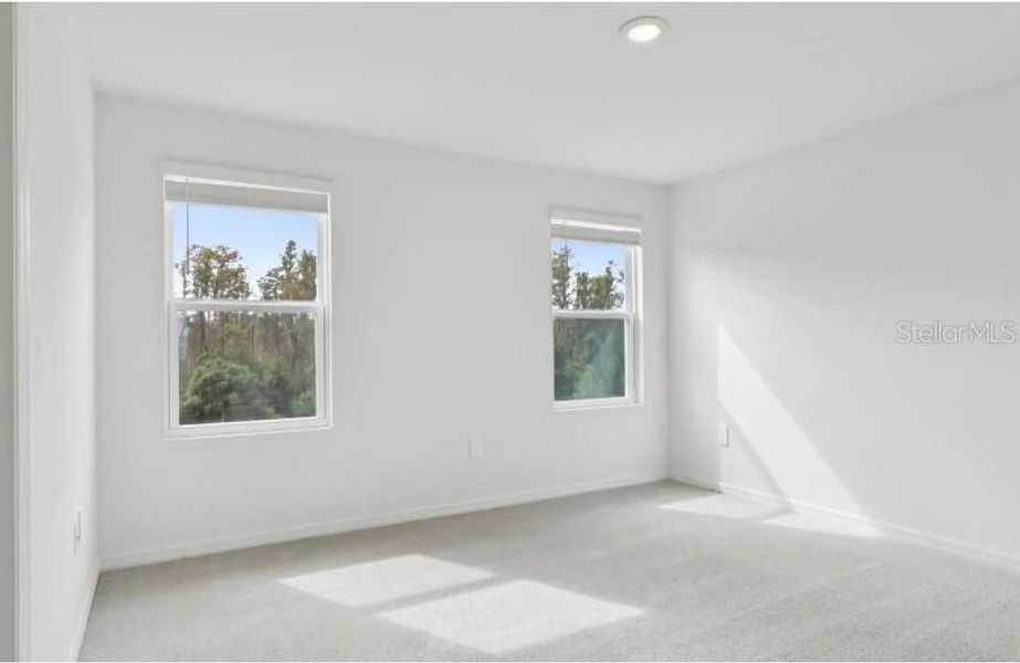 Spacious, unfurnished interior of a new home in Cagan Crossings West, Clermont (Image 10).