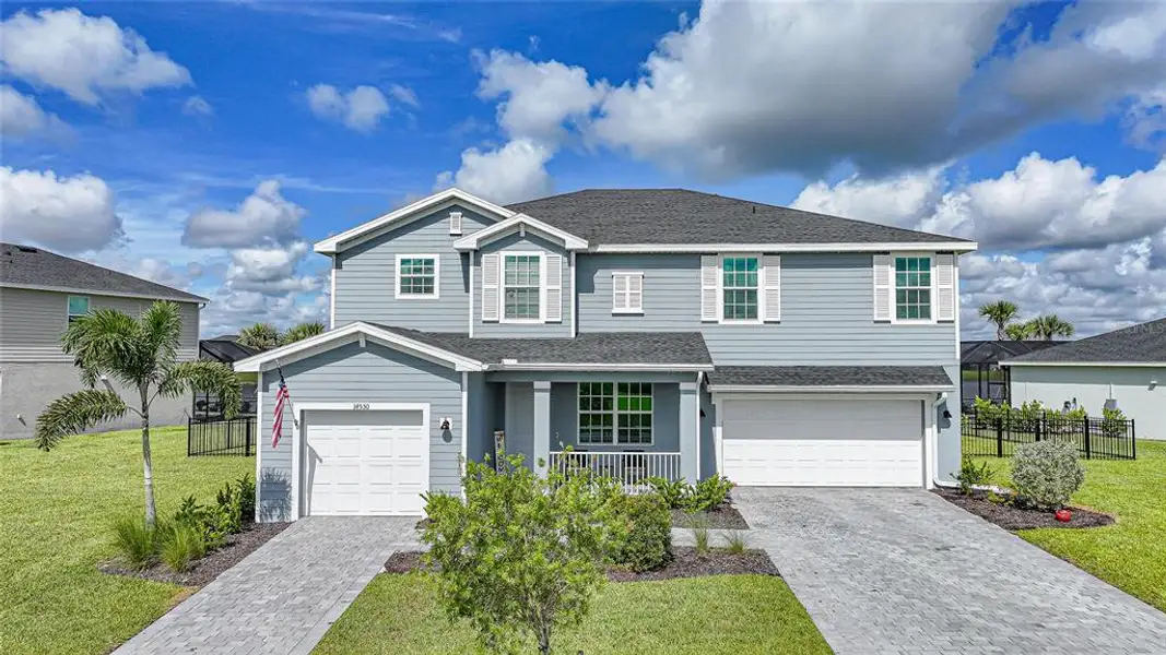 Front exterior of a new home in , Punta Gorda, FL, highlighting curb appeal (Image 29). Front exterior of a new home in , Punta Gorda, FL, highlighting curb appeal (Image 29).