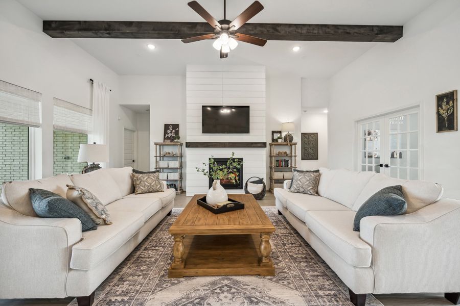 Great room with optional fireplace and optional stained ceiling beams Great room with optional fireplace and optional stained ceiling beams