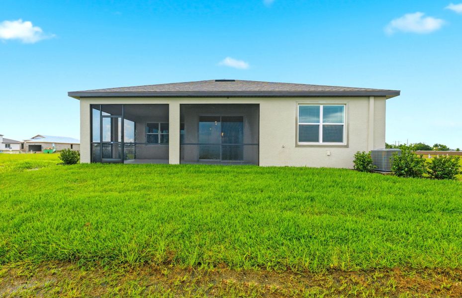Exterior details and patio area of a home in Seaire, Parrish (Image 4).