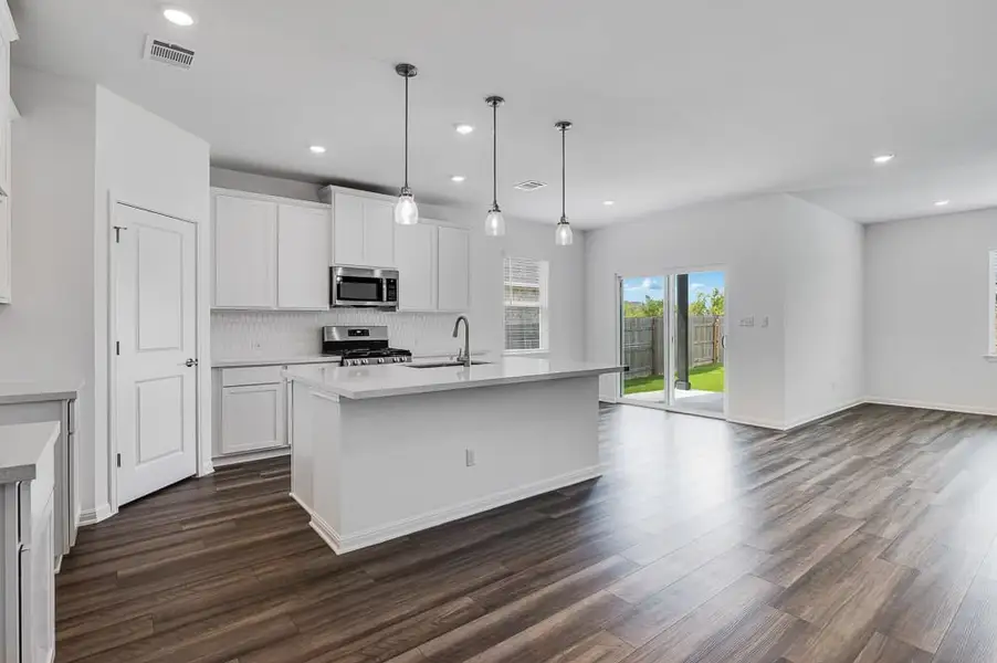 Furnished interior view inside a new home in Longview, Del Valle (Image 3).