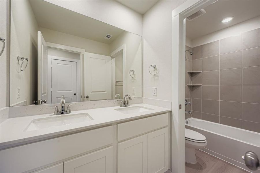 Furnished interior view inside a new home in MiraVerde, Crowley (Image 9).