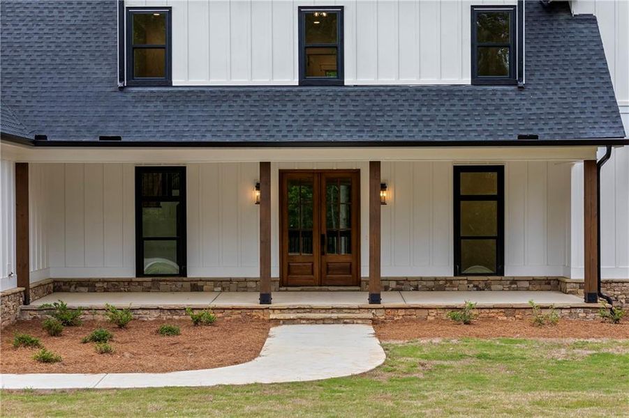 Front exterior of a new home in , Flowery Branch, GA, highlighting curb appeal (Image 56).