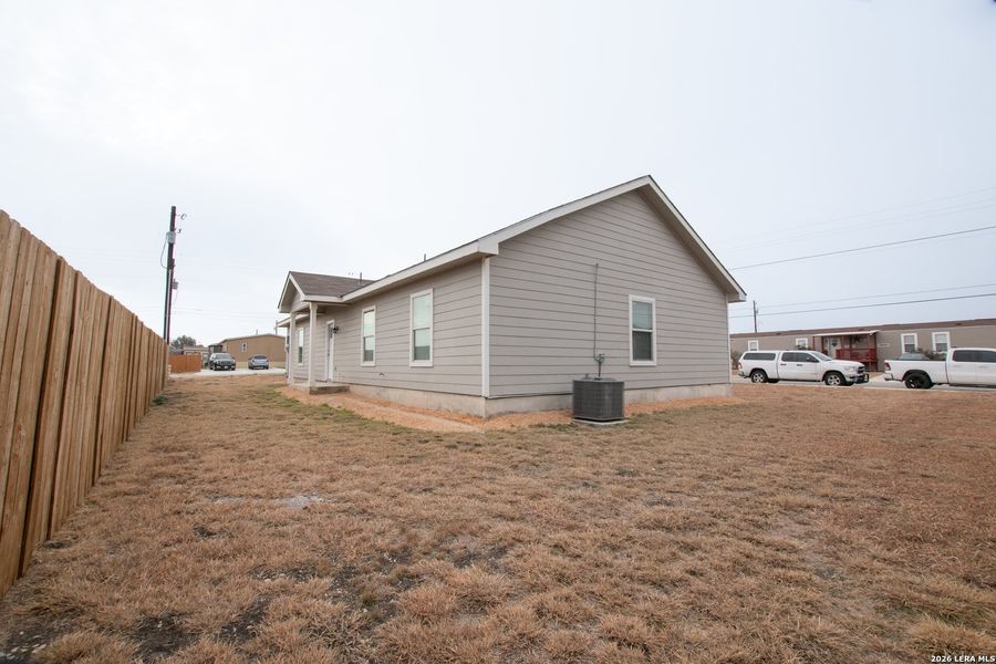 Exterior details and patio area of a home in , New Braunfels (Image 4).