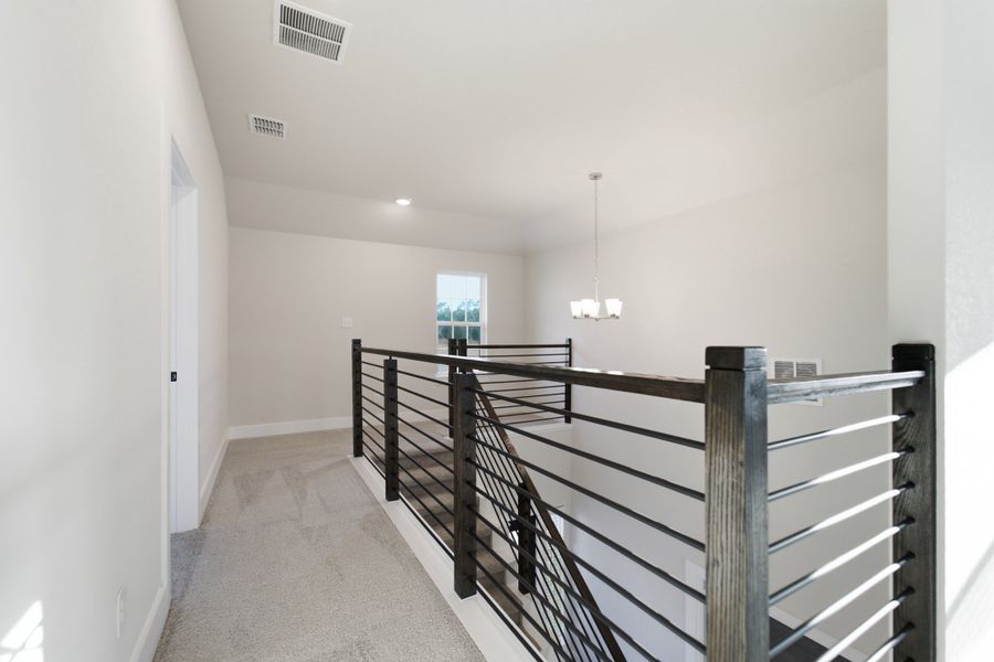 Spacious, unfurnished interior of a new home in The Woodlands at Medina Hills, Mico (Image 33).