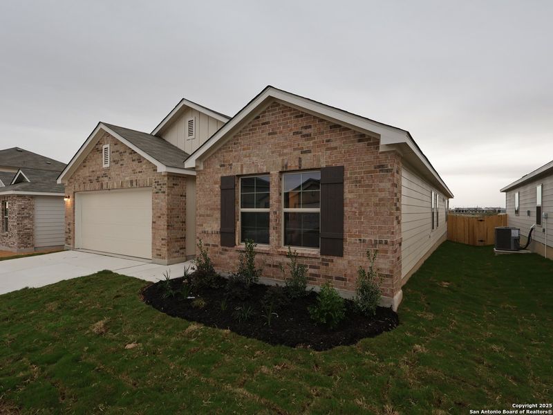 Front exterior of a new home in Paloma Park, Converse, TX, highlighting curb appeal (Image 25). Front exterior of a new home in Paloma Park, Converse, TX, highlighting curb appeal (Image 25).