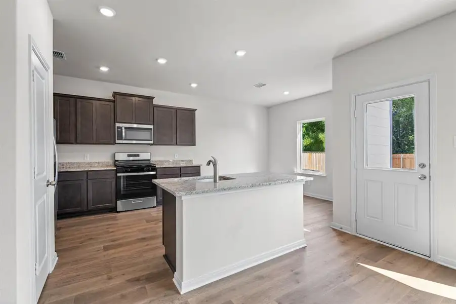 Furnished interior view inside a new home in Big Sky Estates, Ponder (Image 5).