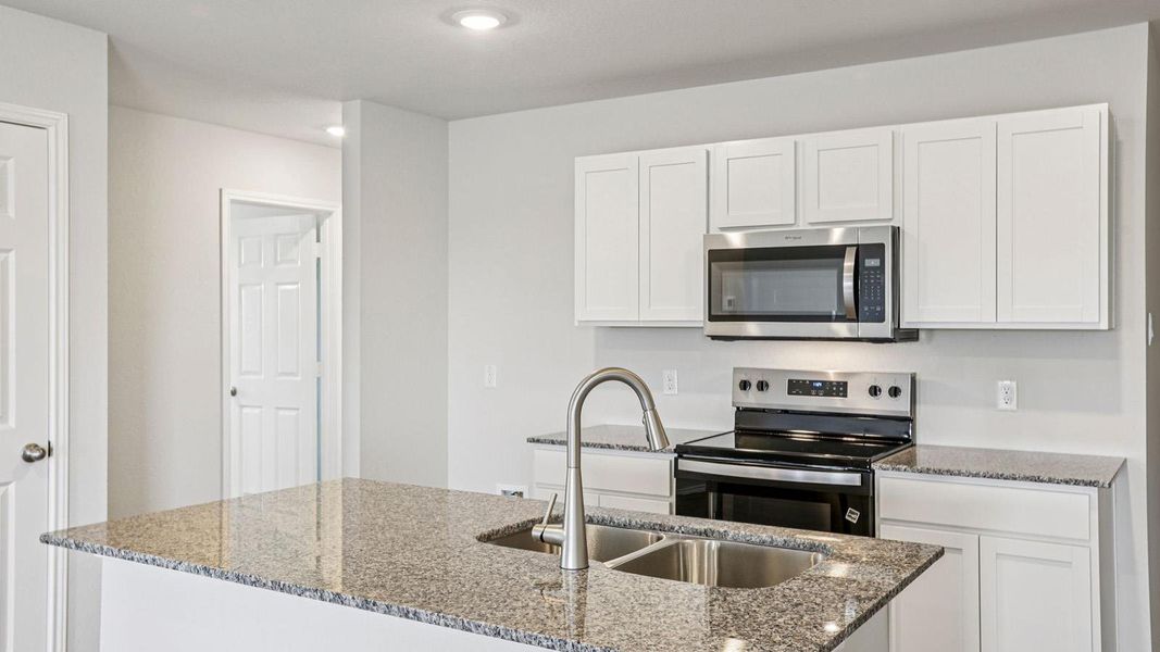 Kitchen island with double basin sink and gooseneck faucet Kitchen island with double basin sink and gooseneck faucet