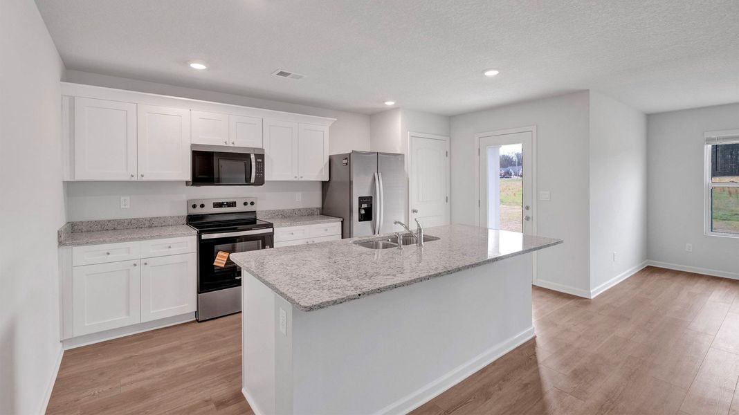 Furnished interior view inside a new home in Riggs Pointe, Millington (Image 3).