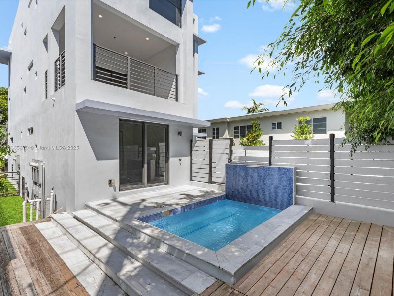 Furnished interior view inside a new home in , Miami Beach (Image 25). Furnished interior view inside a new home in , Miami Beach (Image 25).