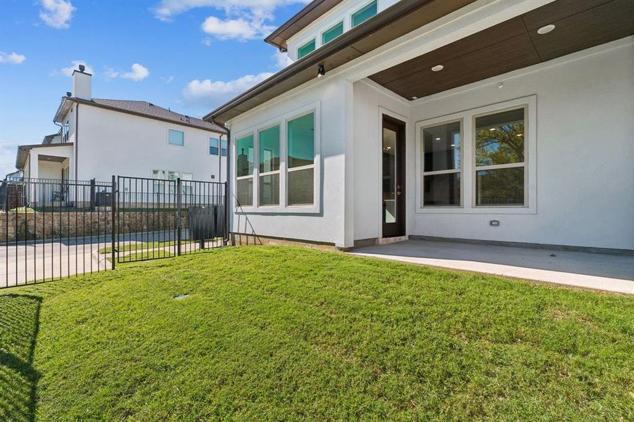 Each unit has a covered patio and small yard.