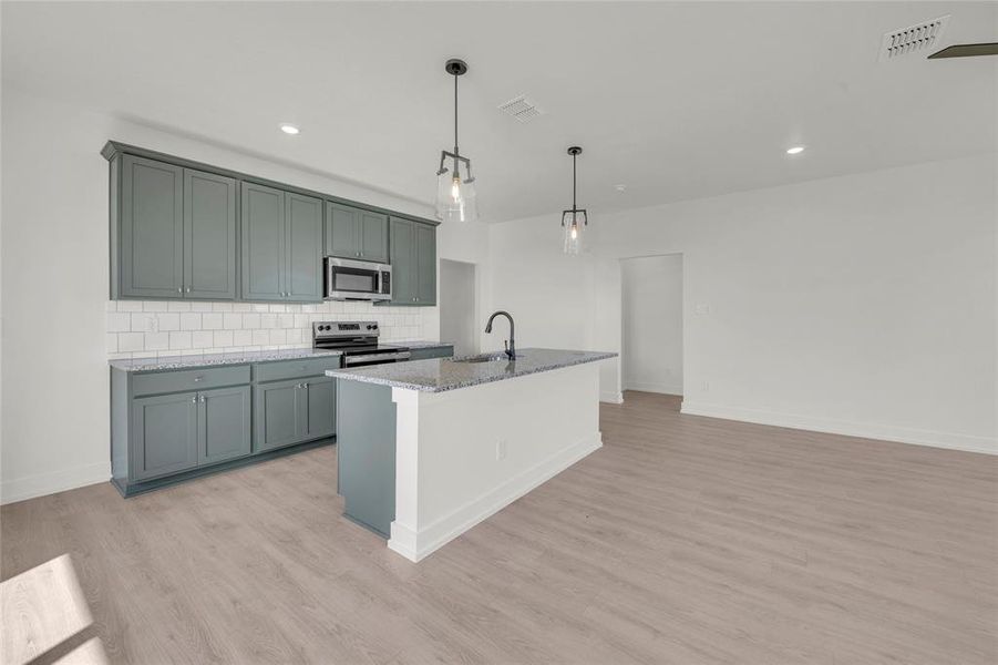 Please Note: These interior photos are not of the actual home but are of a completed one with a similar floor plan. Finishes, features, and layouts may vary.