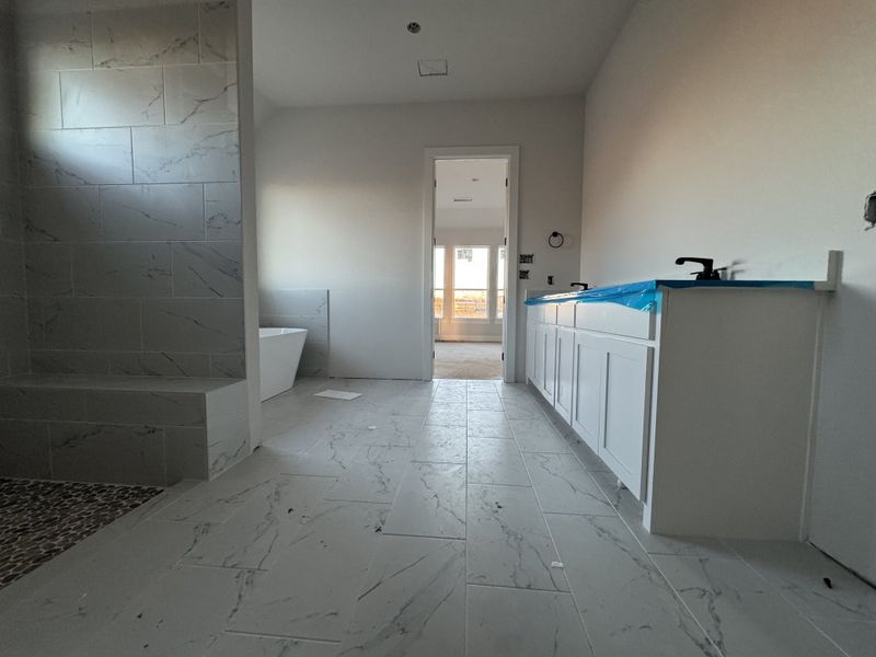 In-progress construction of a new home in Coyote Crossing, Godley, TX (Image 8).