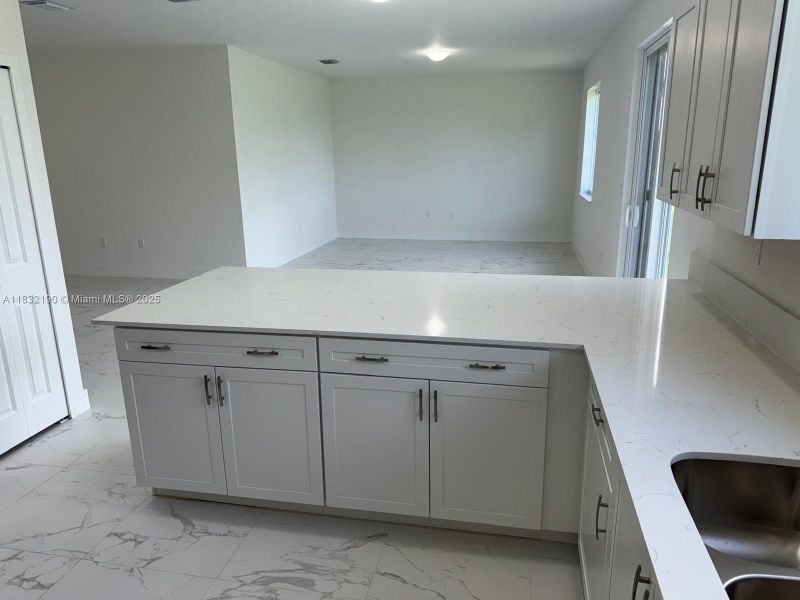 Furnished interior view inside a new home in , Homestead (Image 5). Furnished interior view inside a new home in , Homestead (Image 5).