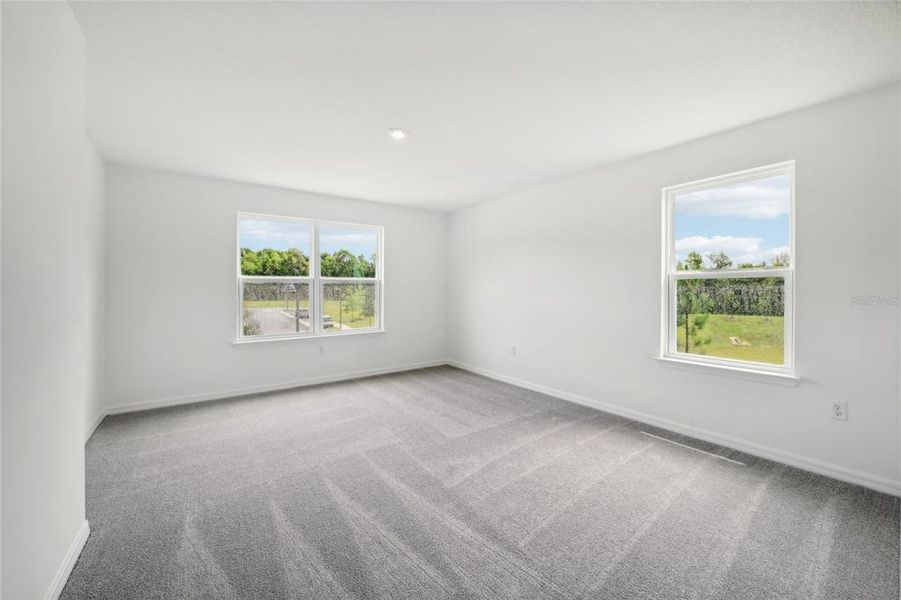 Spacious, unfurnished interior of a new home in Brack Ranch, St. Cloud (Image 25).