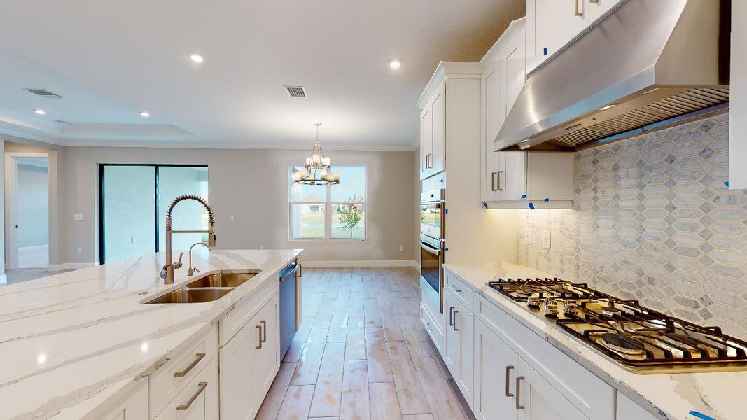 Representative furnished interior of a home built from the Azzurro by Taylor Morrison in Esplanade by the Islands, Naples (Image 6).