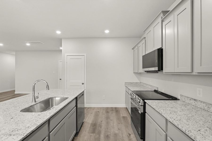 Furnished interior view inside a new home in Crockett Meadows, Conroe (Image 6).