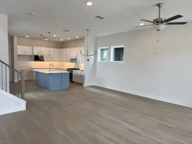 Spacious, unfurnished interior of a new home in Bridgeland Central: Emerald Heights - Cottages Row Collection, Cypress (Image 9). Spacious, unfurnished interior of a new home in Bridgeland Central: Emerald Heights - Cottages Row Collection, Cypress (Image 9).