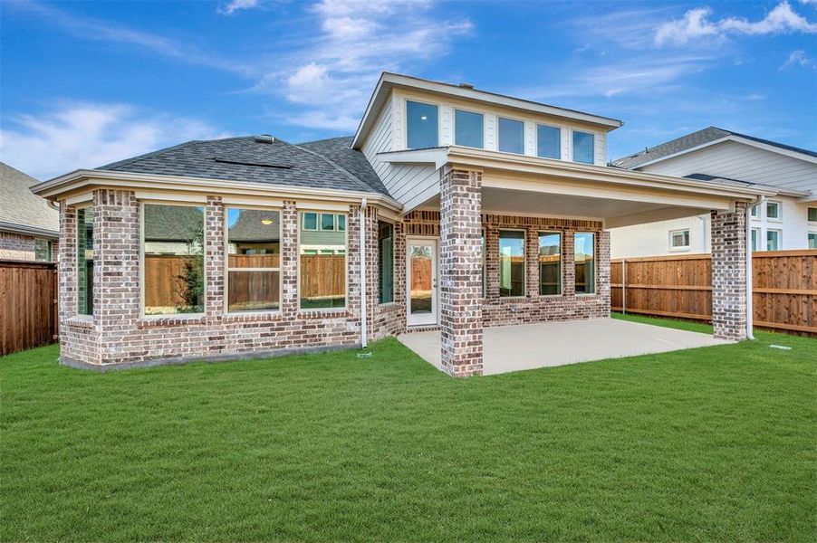 Exterior details and patio area of a home in Lily Creek at Sutton Fields, Aubrey (Image 4).